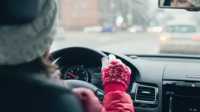 Teenager driving in winter.