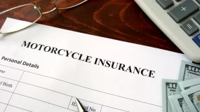 Motorcycle insurance paperwork.
