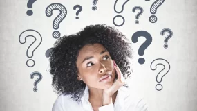 Woman wondering about car insurance.