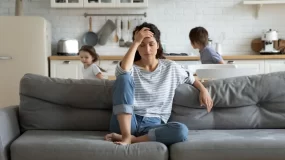 Woman worried about not having homeowners insurance.